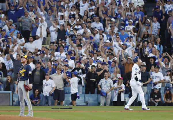 Los Angeles Dodgers designated hitter Shohei Ohtani (17) celebrates after hitting a three-run home run as Milwaukee Brewers pitcher Dustin May (21) watches the ball in the second inning during game four of the MLB, Baseball Herren, USA National League Championship Series at Dodger Stadium in Los Angeles, California, on Thursday, October 15, 2026.  LAP20261015735 CAROLINExBREHMAN