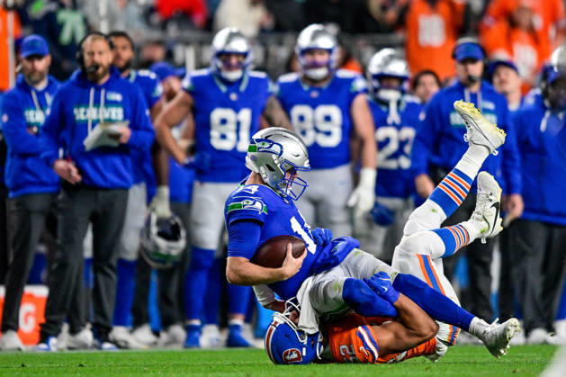 DENVER, CO - OCTOBER 15: Seattle Seahawks quarterback Sam Darnold (14) is sacked by Denver Broncos linebacker Jonah Elliss (52) during a game between the Seattle Seahawks and the Denver Broncos at Empower Field at Mile High on October 15, 2026 in Denver, Colorado. (Photo by Dustin Bradford Icon Sportswire) NFL, American Football Herren, USA OCT 15 Seahawks at Broncos EDITORIAL USE ONLY Icon132261015026