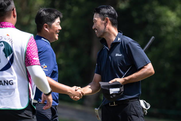 October 16, 2026, Coloane, Macao Sar, China: USAÃ¢â‚¬â ¢s Kevin NA (R) congratulates Sungjae IM (L) from Korea on his round of -7 par bringing him into the lead with -13par. Round 2 in the Macao Open Golf at Macau Golf & Country Club. Coloane China - ZUMAr144 20261016_zap_r144_090 Copyright: xJaynexRussellx
