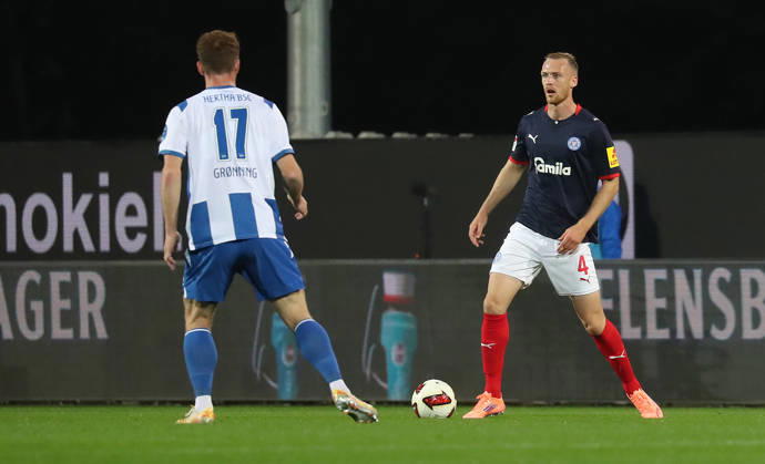 Sebastian Groenning, Hertha BSC Berlin; Sebastian Schonlau, Holstein Kiel; Soccer, Men s, 2026–2027 Season, 2. Bundesliga, Holstein Stadium, Holstein Kiel vs. Hertha BSC Berlin. DFL regulations prohibit any use of photographs as image sequences and or quasi-video.