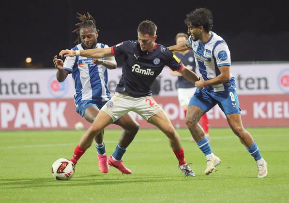 Deyovaisio Zeefuik, Hertha BSC Berlin; Adrian Kapralik, Holstein Kiel; Kevin Sessa, Hertha BSC Berlin; Soccer, Men s, 2026–2027 Season, 2. Bundesliga, Holstein Stadium, Holstein Kiel vs. Hertha BSC Berlin DFL REGULATIONS PROHIBIT ANY USE OF PHOTOGRAPHS AS IMAGE SEQUENCES AND OR QUASI-VIDEO