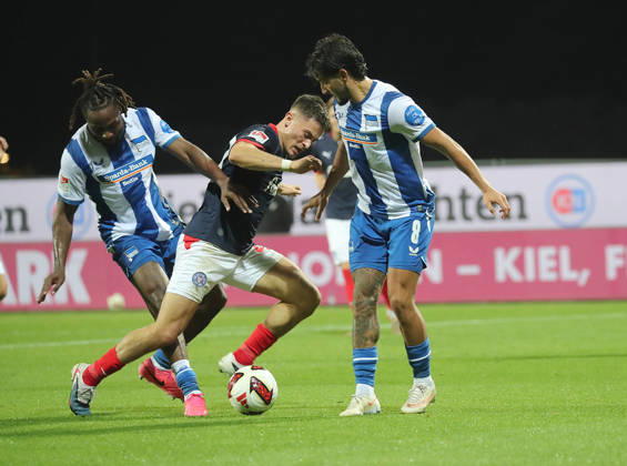 Deyovaisio Zeefuik, Hertha BSC Berlin; Adrian Kapralik, Holstein Kiel; Kevin Sessa, Hertha BSC Berlin; Soccer, Men s, 2026–2027 Season, 2. Bundesliga, Holstein Stadium, Holstein Kiel vs. Hertha BSC Berlin DFL REGULATIONS PROHIBIT ANY USE OF PHOTOGRAPHS AS IMAGE SEQUENCES AND OR QUASI-VIDEO