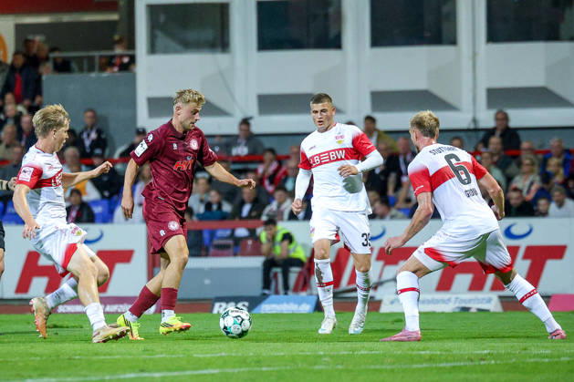 October 16, 2026, xsefx, soccer, SC Fortuna Köln vs. VfB Stuttgart II, 3rd Division, Südstation, Matchday 10, 2026–2027 season: Cedric Harenbrock (Fortuna Köln) No. 14 in a tackle with Yanik Spalt (VfB Stuttgart II) No. 08, Enis Redzepi (VfB Stuttgart II, 39) and Alexander Groiß (VfB Stuttgart II, 06). DFB regulations prohibit any use of photographs as image sequences and or quasi-video. North Rhine-Westphalia, Germany