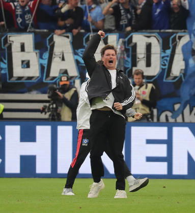Coach Merlin Polzin of Hamburger SV celebrates after scoring the 1-0 goal. Soccer, Men s, 2026–2027 season, 1st Division, Volksparkstadion, Hamburger SV vs. VfB Stuttgart, 1–0. DFL regulations prohibit any use of photographs as image sequences and or quasi-video.
