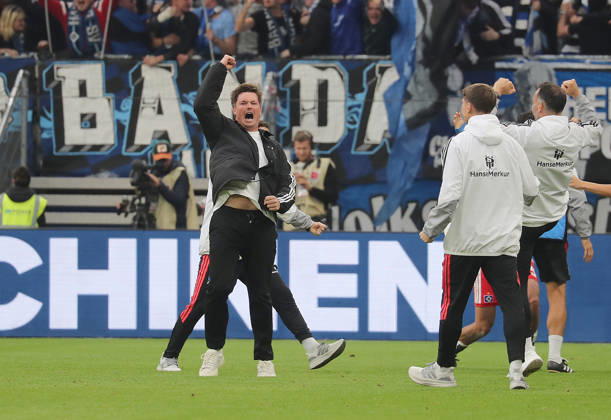 Coach Merlin Polzin of Hamburger SV celebrates after scoring the 1-0 goal. Soccer, Men s, 2026–2027 season, 1st Division, Volksparkstadion, Hamburger SV vs. VfB Stuttgart, 1–0. DFL regulations prohibit any use of photographs as image sequences and or quasi-video.
