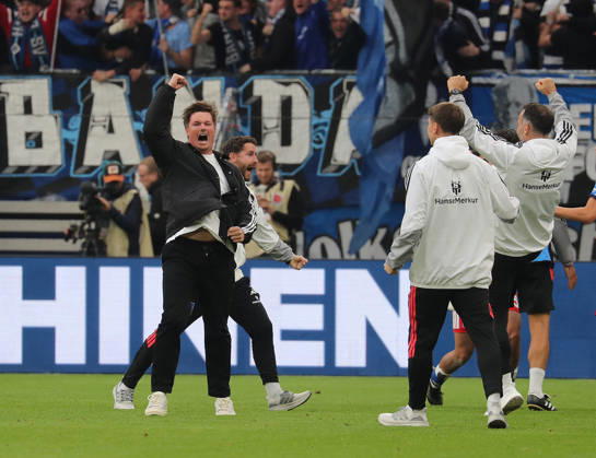 Coach Merlin Polzin of Hamburger SV celebrates after scoring the 1-0 goal. Soccer, Men s, 2026–2027 season, 1st Division, Volksparkstadion, Hamburger SV vs. VfB Stuttgart, 1–0. DFL regulations prohibit any use of photographs as image sequences and or quasi-video.