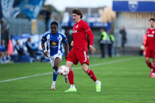October 17, 2026, Soccer, Men s, Regionalliga Nord, Matchday 14, BSV Kickers Emden 1 FC Phönix Lübeck Michael Igwe (18) of BSV Kickers Emden in a tackle with Moritz Kretzer (14) of Phönix Lübeck