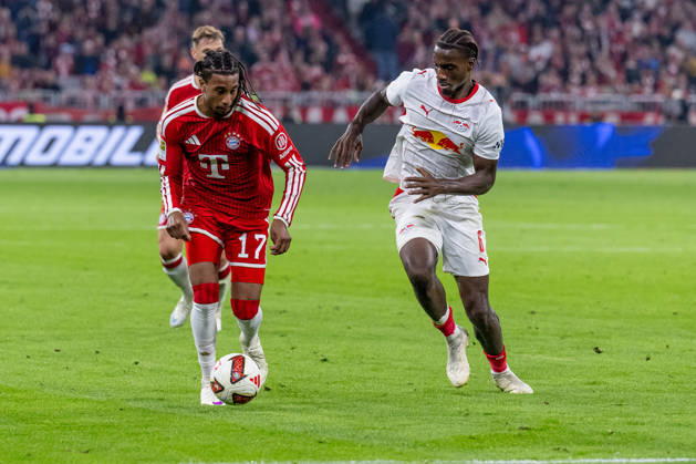 Battle for the Ball: Tackle between Michael Olise (FC Bayern Munich, 17) and Ezechiel Banzuzi (RB Leipzig, 06 GER), FC Bayern Munich vs. RB Leipzig, Soccer, Bundesliga, Matchday 6, 2026–2027 Season, October 17, 2026 DFL DFB REGULATIONS PROHIBIT ANY USE OF PHOTOGRAPHS as IMAGE SEQUENCES and or QUASI-VIDEO Photo: HMB Media, Heike Feiner Copyright: HMBxMedia HeikexFeiner