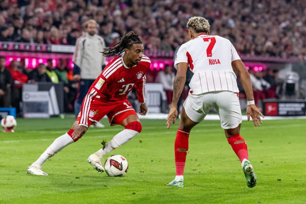 Battle for the Ball: Tackle between Michael Olise (FC Bayern Munich, 17) and Antonio Nusa (RB Leipzig, 07 GER), FC Bayern Munich vs. RB Leipzig, Soccer, Bundesliga, Matchday 6, 2026–2027 Season, October 17, 2026 DFL DFB regulations prohibit any use of photographs as image sequences and or quasi-video. Photo: HMB Media, Heike Feiner Copyright: HMBxMedia HeikexFeiner