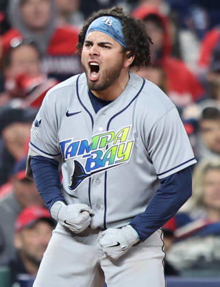 Tampa Bay Rays Jonathan Aranda (8) celebrates on third base after hitting a two-rbi single then advancing to third on a fielding error by Cleveland Guardians right fielder Chase DeLauter in the seventh inning during game four of the MLB, Baseball Herren, USA American League Championship Series at Progressive Field in Cleveland, Ohio, on Saturday, October 17, 2026.  CLE20261017728 AARONxJOSEFCZYK