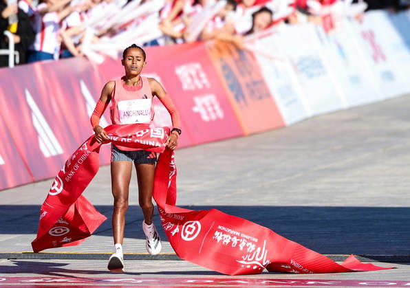 (261018) -- BEIJING, Oct. 18, 2026 -- Anchinalu Dessie Genaneh of Ethiopia crosses the finish line to win the first place of the women s marathon event at the 2026 Beijing Marathon & National Marathon Championships in Beijing, capital of China, Oct. 18, 2026. ) (SP)CHINA-BEIJING-2026 BEIJING MARATHON (CN) LuoxYuan 