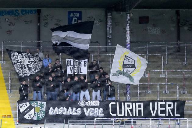 The SC Verl ultras who traveled with the team are waving their flags in the fan section; visiting fans, visiting section, visitors, fan section, looking forward to the game; fans, audience, spectators, mood, atmosphere, stadium, October 18, 2026, Sinsheim, Germany, soccer, 3rd Division, TSG 1899 Hoffenheim II vs. SC Verl; DFB and DFL regulations prohibit any use of photographs as image sequences and or quasi-video xozx