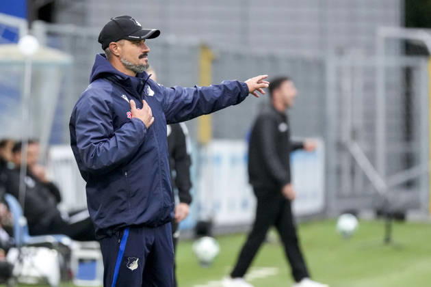 Stefan Kleineheismann, coach and head coach of TSG II, gives instructions, gesturing with his arms; single frame, single photo, action, October 18, 2026, Sinsheim, Germany, soccer, 3rd League, TSG 1899 Hoffenheim II vs. SC Verl; DFB and DFL regulations prohibit any use of photographs as image sequences and or quasi-video xozx