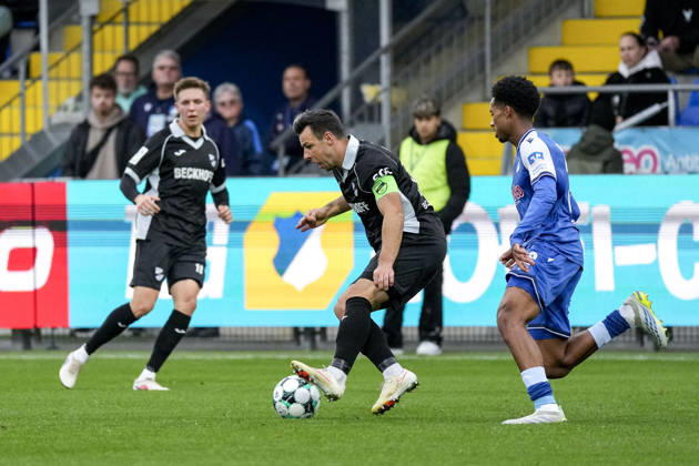 From left: Niko Kijewski (Verl), 19, captain; Natnael Abraha (TSG II), 2; tackle, game scene, duel, tackle, tackling, dynamism, action, 10 18 2026, Sinsheim, Germany, soccer, 3rd League, TSG 1899 Hoffenheim II vs. SC Verl, DFB and DFL regulations prohibit any use of photographs as image sequences and or quasi-video xozx