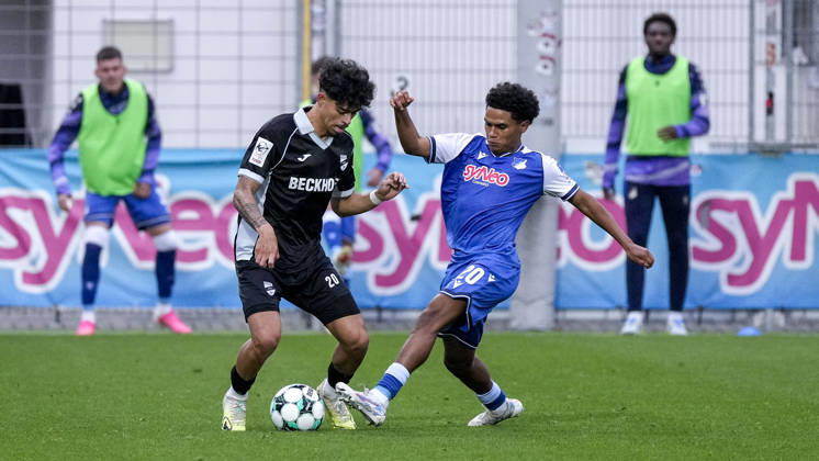 from left: Andre Leipold (Verl), 20, Tiago Poller (TSG II), 20, tackle, game scene, duel, tackle, tackling, dynamic, action, 18 10 2026, Sinsheim, Germany, soccer, 3rd Division, TSG 1899 Hoffenheim II vs. SC Verl, DFB and DFL regulations prohibit any use of photographs as image sequences and or quasi-video xozx