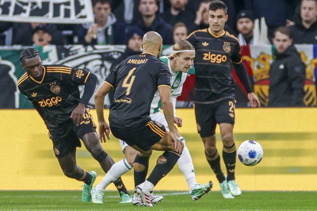 GRONINGEN , 18-10-2026 , Euroborg Stadium, season 2026 2027 , Dutch Eredivisie Football , match between FC Groningen and Ajax. Picture shows FC Groningen player David van der Werff and Ajax player Sofyan Amrabat Groningen - Ajax  x208696663x Copyright: