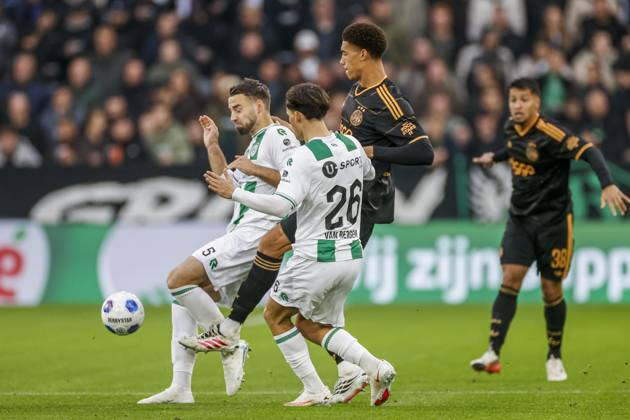 GRONINGEN , 18-10-2026 , Euroborg Stadium, season 2026 2027 , Dutch Eredivisie Football , match between FC Groningen and Ajax. Picture shows FC Groningen player Marco Rente, FC Groningen player Thom van Bergen, Ajax player Aaron Bouwman Groningen - Ajax  x208697509x Copyright: