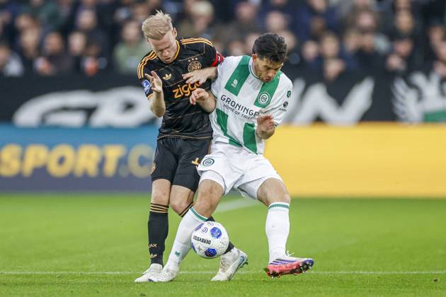 GRONINGEN , 18-10-2026 , Euroborg Stadium, season 2026 2027 , Dutch Eredivisie Football , match between FC Groningen and Ajax. Picture shows Ajax player Davy Klaassen FC Groningen player Pelle Clement Groningen - Ajax  x208697913x Copyright: