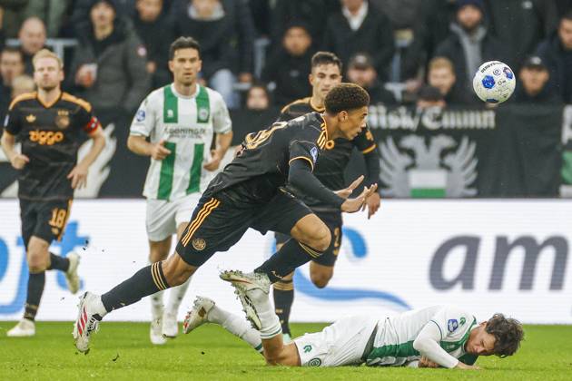 GRONINGEN , 18-10-2026 , Euroborg Stadium, season 2026 2027 , Dutch Eredivisie Football , match between FC Groningen and Ajax. Picture shows Ajax player Aaron Bouwman and FC Groningen player Thom van Bergen Groningen - Ajax  x208699380x Copyright: