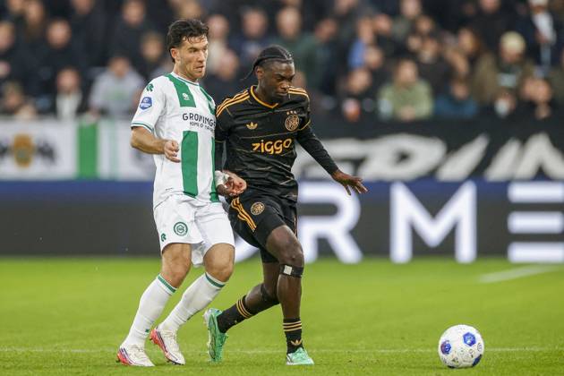 GRONINGEN , 18-10-2026 , Euroborg Stadium, season 2026 2027 , Dutch Eredivisie Football , match between FC Groningen and Ajax. Picture shows FC Groningen player Pelle Clement and Ajax player Jorthy Mokio Groningen - Ajax  x208699827x Copyright: