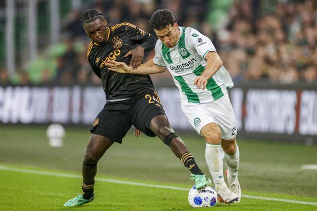 GRONINGEN , 18-10-2026 , Euroborg Stadium, season 2026 2027 , Dutch Eredivisie Football , match between FC Groningen and Ajax. Picture shows Ajax player Jorthy Mokio and FC Groningen player Pelle Clement Groningen - Ajax  x208700690x Copyright: