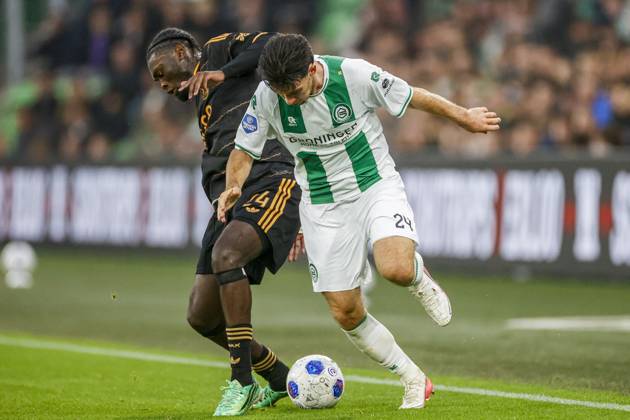 GRONINGEN , 18-10-2026 , Euroborg Stadium, season 2026 2027 , Dutch Eredivisie Football , match between FC Groningen and Ajax. Picture shows Ajax player Jorthy Mokio and FC Groningen player Pelle Clement Groningen - Ajax  x208700714x Copyright: