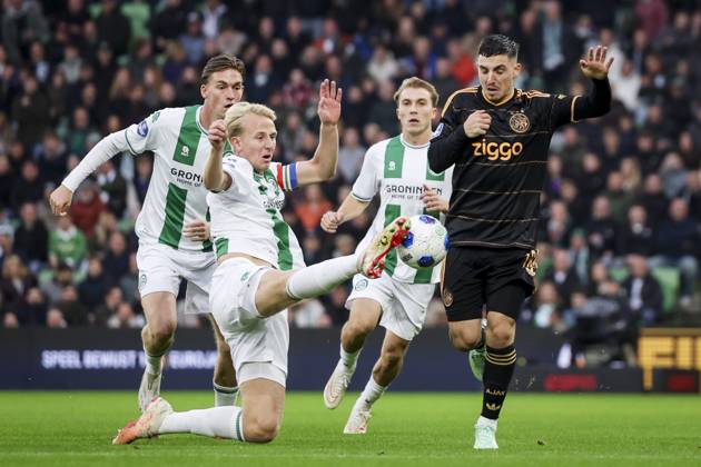 GRONINGEN - (lr) = David van der Werff of FC Groningen, Thijmen Blokzijl of FC Groningen, Jorg Schreuders of FC Groningen and Oscar Gloukh of Ajax during the Dutch Eredivisie match between FC Groningen and Ajax at the Euroborg stadium on October 18, 2026 in Groningen, the Netherlands. SONNY LENSEN ANP Eredivisie 2026 27 xVIxANPxSportx xxANPxIVx 572852345 originalFilename: 572852345.jpg