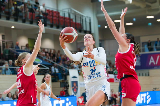 Lilly Küppers (Lions), 34, Amelia Sophia Hassett (Marburg), 22, Alexia Allesch (Lions), 0, halfit Lions vs. BC Marburg Blue Dolphins, Women s Basketball, 1st Bundesliga, DBBL, Matchday 3 of the 2026–27 season, October 18, 2026, SWH Arena, Saxony-Anhalt, Germany