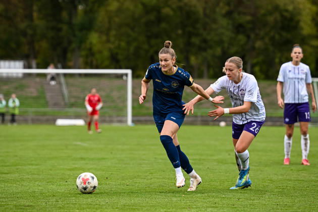 October 18, 2026, Soccer, Women s Bundesliga 2, 2026–2027, Matchday 9, SG 99 Andernach vs. SGS Essen; Carolin Schraa 7 (Andernach) holds her own against Lany; Mia Bäcker 26 (Essen)