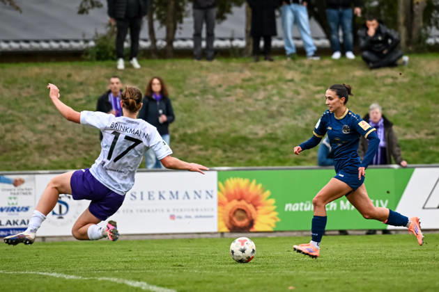 October 18, 2026, Soccer, Women s Bundesliga 2, 2026–2027, Matchday 9, SG 99 Andernach vs. SGS Essen, Karla Brinkmann 17, Essen attempts to strip Muriel Bey of the ball with a sliding tackle