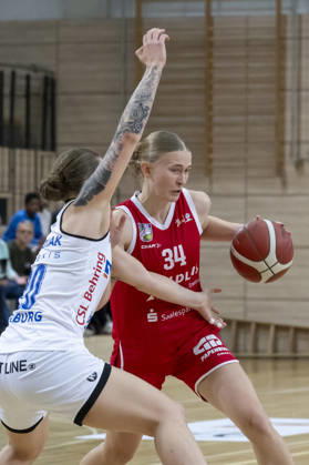 Toyota DBBL 2026–2027: HalFit Lions vs. BC Marburg, Halle an der Saale, Germany, October 18, 2026. Pictured, from left, in a one-on-one matchup: Lea Debeljak (Marburg) and Lilly Kueppers (Halle an der Saale), at the swh Arena in Saxony-Anhalt, Germany.