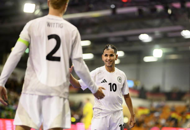 Fouad Aghnima (GER) and Christopher Wittig (GER) celebrate after scoring the goal that made the score 3–2 in the Futsal World Cup qualifying match between Germany and Lithuania (4–2), on October 18, 2026, at the Westenergie Sporthalle in Mülheim an der Ruhr, Germany