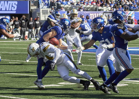 New York Giants kick returner Charlie Jones (89) is hit by New Orleans Saints linebacker Isaiah Stalbird (44) and fumbles during a NFL, American Football Herren, USA game at MetLife Stadium in East Rutherford, New Jersey. CSM East Rutherford United States - ZUMAc04_ 20261018_zma_c04_156 Copyright: xDuncanxWilliamsx