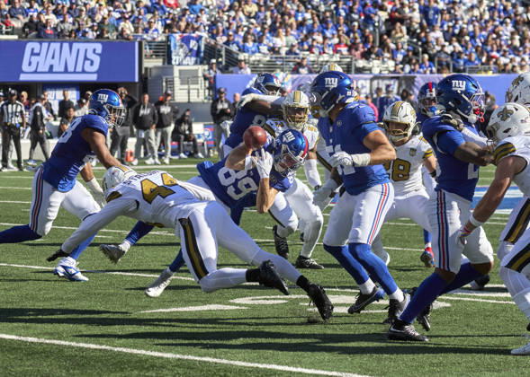New York Giants kick returner Charlie Jones (89) fumbles after a hit by New Orleans Saints linebacker Isaiah Stalbird (44) during a NFL, American Football Herren, USA game at MetLife Stadium in East Rutherford, New Jersey. CSM East Rutherford United States - ZUMAc04_ 20261018_zma_c04_152 Copyright: xDuncanxWilliamsx