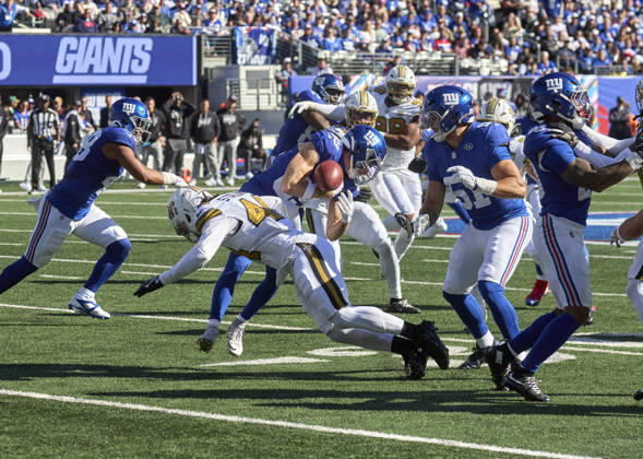 New York Giants kick returner Charlie Jones (89) is hit by New Orleans Saints linebacker Isaiah Stalbird (44) and fumbles the ball during a NFL, American Football Herren, USA game at MetLife Stadium in East Rutherford, New Jersey. CSM East Rutherford United States - ZUMAc04_ 20261018_zma_c04_155 Copyright: xDuncanxWilliamsx
