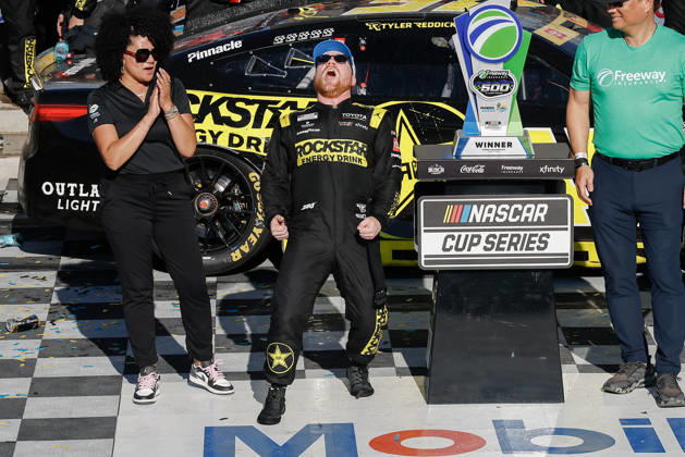 AVONDALE, AZ - OCTOBER 18: Tyler Reddick ( 45 23XI Racing ROCKSTAR ENERGY DRINK Toyota) celebrates after winning the NASCAR, Motorsport, USA Cup Series Playoffs Freeway Insurance 500 on October 18, 2026, at Phoenix Raceway in Avondale, AZ. (Photo by Kevin Abele Icon Sportswire) AUTO: OCT 18 NASCAR Cup Series Playoffs Freeway Insurance 500 EDITORIAL USE ONLY Icon261018001500