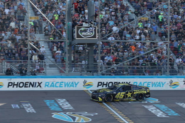 AVONDALE, AZ - OCTOBER 18: Tyler Reddick ( 45 23XI Racing ROCKSTAR ENERGY DRINK Toyota) crosses the finish line to win the NASCAR, Motorsport, USA Cup Series Playoffs Freeway Insurance 500 on October 18, 2026, at Phoenix Raceway in Avondale, AZ. (Photo by Kevin Abele Icon Sportswire) AUTO: OCT 18 NASCAR Cup Series Playoffs Freeway Insurance 500 EDITORIAL USE ONLY Icon261018002500