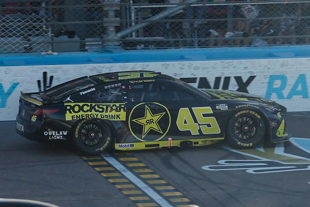 AVONDALE, AZ - OCTOBER 18: Tyler Reddick ( 45 23XI Racing ROCKSTAR ENERGY DRINK Toyota) burns out after winning the NASCAR, Motorsport, USA Cup Series Playoffs Freeway Insurance 500 on October 18, 2026, at Phoenix Raceway in Avondale, AZ. (Photo by Kevin Abele Icon Sportswire) AUTO: OCT 18 NASCAR Cup Series Playoffs Freeway Insurance 500 EDITORIAL USE ONLY Icon261018004500