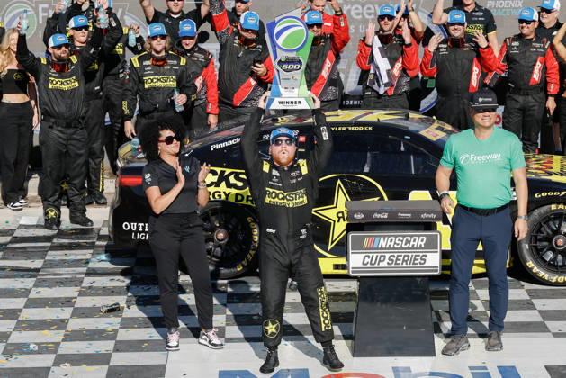 AVONDALE, AZ - OCTOBER 18: Tyler Reddick ( 45 23XI Racing ROCKSTAR ENERGY DRINK Toyota) celebrates with the trophy after winning the NASCAR, Motorsport, USA Cup Series Playoffs Freeway Insurance 500 on October 18, 2026, at Phoenix Raceway in Avondale, AZ. (Photo by Kevin Abele Icon Sportswire) AUTO: OCT 18 NASCAR Cup Series Playoffs Freeway Insurance 500 EDITORIAL USE ONLY Icon261018010500