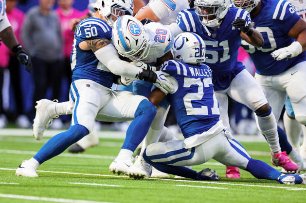 Oct 18, 2026; Indianapolis, IN, USA; Tennessee Titans running back Tony Pollard (20) runs with the ball as Indianapolis Colts cornerback Justin Walley (27) attempts to make the tackle during NFL, American Football Herren, USA game action at Lucas Oil Stadium. Mandatory Credit: -Cal Media NFL 2026: Titans Vs Colts OCT 18 - ZUMAc04_ 20261018_zma_c04_328 Copyright: xJohnxMersitsx