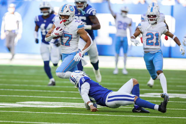 Oct 18, 2026; Indianapolis, IN, USA; Tennessee Titans wide receiver Chimere Dike (17) returns punt as Indianapolis Colts punter Rigoberto Sanchez (8) defends during NFL, American Football Herren, USA game action at Lucas Oil Stadium. Mandatory Credit: -Cal Media Indianapolis USA - ZUMAc04_ 20261018_zma_c04_333 Copyright: xJohnxMersitsx