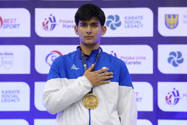 2026 World Cadet, Junior & U21, U 21 Karate Championships BIELSKO-BIALA, POLAND - OCTOBER 17: Gold medallist Shamo Kamilov of Azerbaijan stands on the podium during the medal ceremony for the cadet male kumite +70kg at the 2026 World Cadet, Junior & U21 Karate Championships at Hala Pod Debowcem on October 17, 2026 in Bielsko-Biala, Poland. Bielsko-Biala Hala Pod Debowcem Poland Copyright: x2026xKaratexInsights PSxImagesxKjetilxWaber KaratexInsightsx