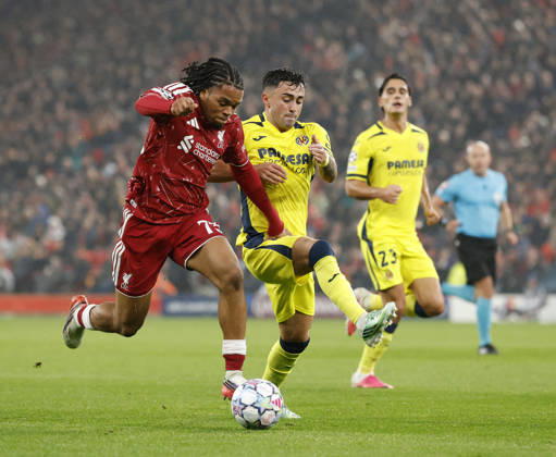 Liverpool, England, 20th October 2026. Rio Ngumoha of Liverpool tussles with Alberto Moleiro of Villarreal during the Liverpool vs Villarreal UEFA Champions League match at Anfield, Liverpool. Picture credit should read: Cody Froggatt Sportimage EDITORIAL USE ONLY. No use with unauthorised audio, video, data, fixture lists, club league logos or live services. Online in-match use limited to 120 images, no video emulation. No use in betting, games or single club league player publications. SPI_014_CF_LIVERPOOL_VILLARREAL SPI-5089-0014