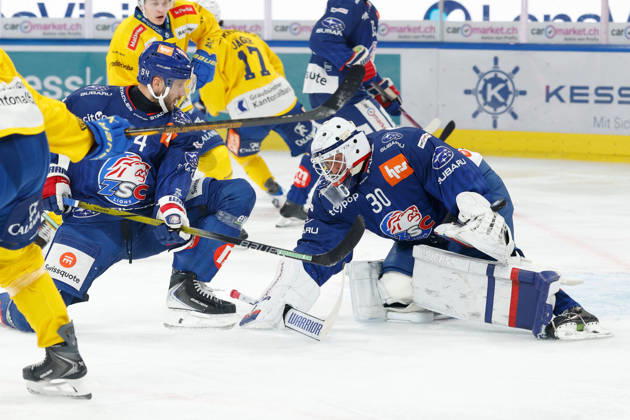 October 20, 2026, Swiss Life Arena, Zurich, SWITZERLAND, 2026–2027 Season, Men s Ice Hockey National League: ZSC Lions vs. HC Davos; Christian Marti (ZSC) and goaltender Simon Hrubec (ZSC) defend