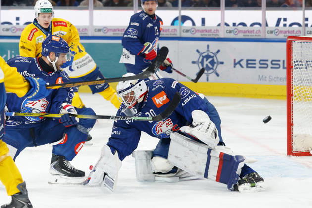 October 20, 2026, Swiss Life Arena, Zurich, SWITZERLAND, 2026–2027 Season, Men s Ice Hockey National League: ZSC Lions vs. HC Davos; Christian Marti (ZSC) and goaltender Simon Hrubec (ZSC) defend