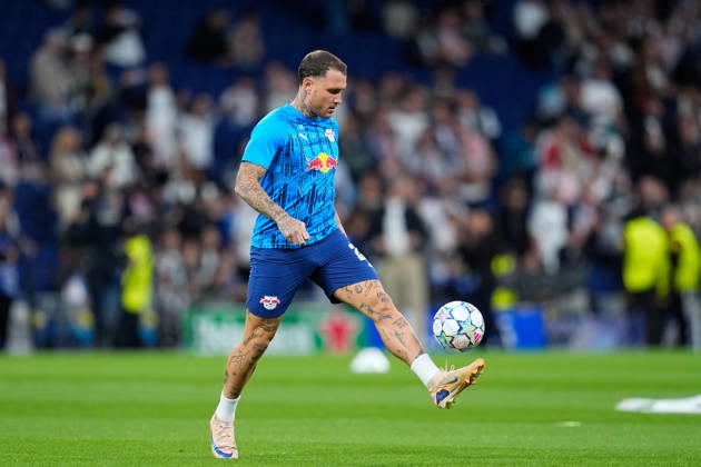 October 21, 2026, Madrid, Madrid, Spain: David Raum of RB Leipzig warms up during the UEFA Champions League 2026 27 League Phase MD3 match between Real Madrid CF and RB Leipzig at Bernabeu stadium on October 21, 2026, in Madrid, Spain. Real Madrid CF V RB Leipzig - UEFA Champions League 2026 27 League Phase MD3  - ZUMAa181 20261021_zaa_a181_046 Copyright: xDennisxAgyemanx