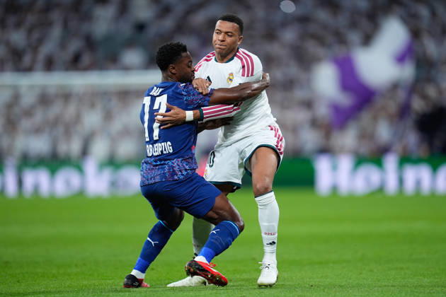 October 21, 2026, Madrid, Madrid, Spain: Ridle Baku of RB Leipzig and Kylian Mbappe of Real Madrid CF compete for the ball during the UEFA Champions League 2026 27 League Phase MD3 match between Real Madrid CF and RB Leipzig at Bernabeu stadium on October 21, 2026, in Madrid, Spain. Real Madrid CF V RB Leipzig - UEFA Champions League 2026 27 League Phase MD3 - ZUMAa181 20261021_zaa_a181_126 Copyright: xDennisxAgyemanx