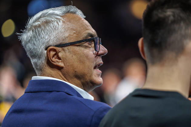 October 26, 2021, Berlin, Volleyball 1st Bundesliga, Men, Matchday 1, BR Volleys vs. VFT 1844 Freiburg, Max Schmeling Halle; Coach Andrea Anastasi of BR Volleys sits on the sidelines gesturing; BR Volleys vs. VFT 1844 Freiburg