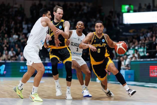 Nick Johnson of KK Croatia Split and Mindaugas Kacinas of KK Croatia Split go head-to-head with Behnam Yakhchali of the Gladiators Trier and Behnam Yakhchali of the Gladiators Trier, Action: Vet Concept Gladiators Trier vs. KK Split, Basketball, FIBA Europe Cup, Matchday 3, 2026–2027 season, October 21, 2026, Vet Concept Gladiators Trier vs. KK Split, Basketball, FIBA Europe Cup, Matchday 3, 2026–2027 season, October 21, 2026 Copyright: xEibnerxPressefotox EP_ANS