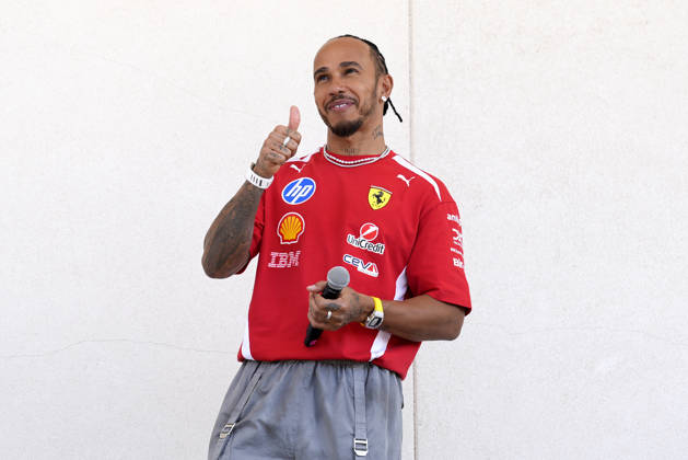 British Formula One driver Lewis Hamilton of Scuderia Ferrari speaks to students during the Formula One United States Grand Prix at the Circuit of the Americas in Austin, Texas on Thursday, October 22, 2026.  AUS2026102212 GREGxNASH